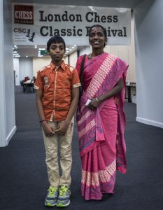 Grandmaster hopeful Praggu with his mother. Photo by LENNART OOTES
