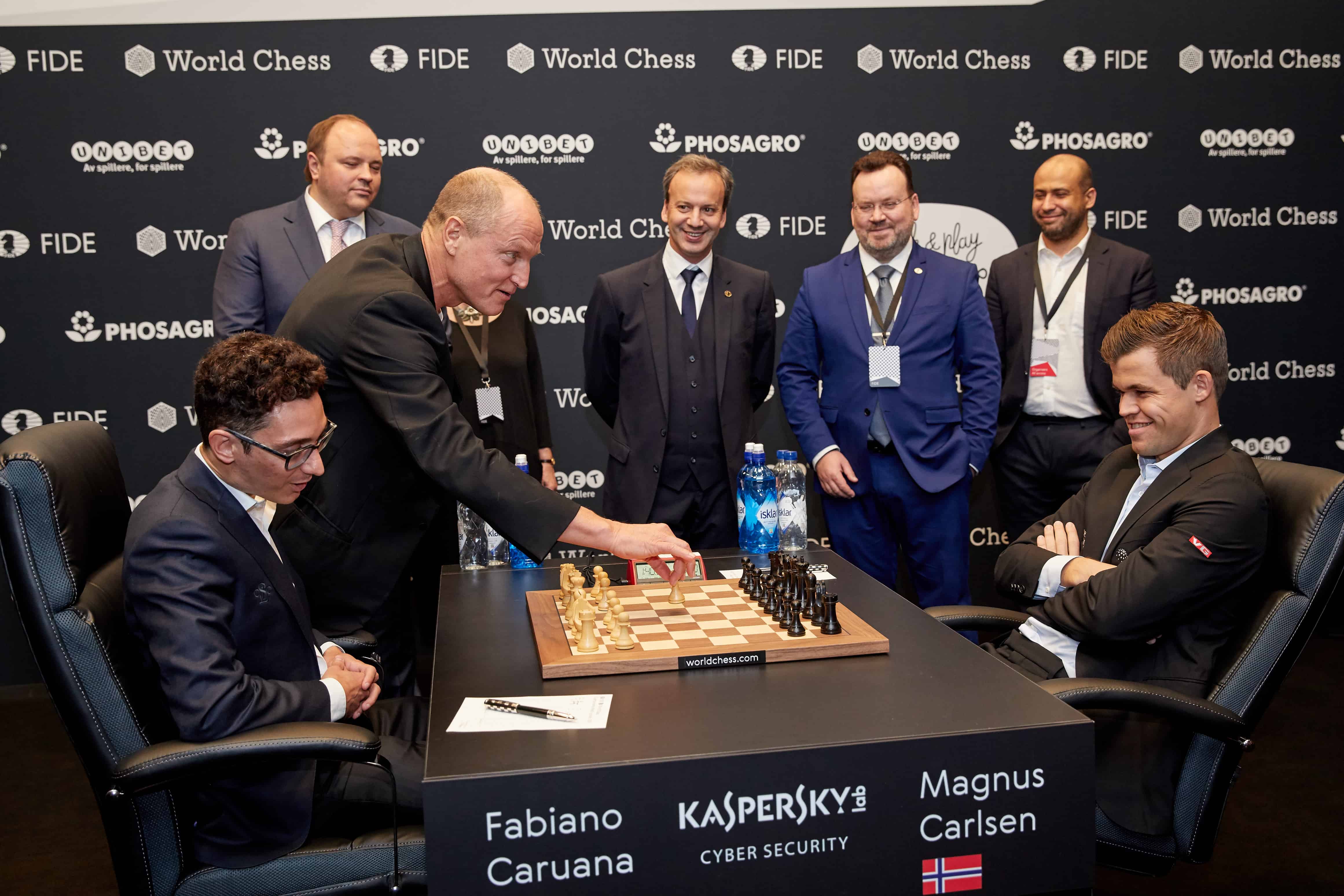 Andrey Guryev, Vice President and Member of the Board of Trustees of the Russian Chess Federation, CEO of PhosAgro, Woody Harrelson, Arkady Dvorkovich, President of FIDE, Stepahne Escafre, The Chief Arbiter of the Match, Ilya Merenzon, CEO of World Chess, Magnus Carlsen, the reigning World Chess Champion and Fabiano Caruana, US Challenger during the First Move Ceremony (Round 1) of the FIDE World Chess Championship Match 2018 on November 9, 2018 in London, England. (Photo by Tristan Fewings/Getty Images for World Chess ) *** Local Caption *** Andrey Guryev; Woody Harrelson; Arkady Dvorkovich; Stepahne Escafre; Ilya Merenzon; Magnus Carlsen; Fabiano Caruana